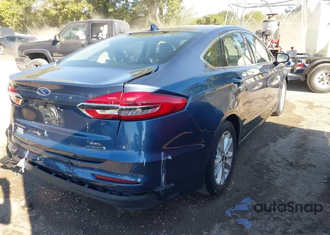 2019 Ford Fusion Hybrid Sel z USA, uszkodzony, nr VIN 3FA6P0MUXKR117824